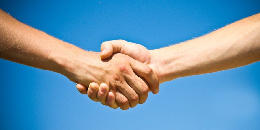 Two people shaking hands